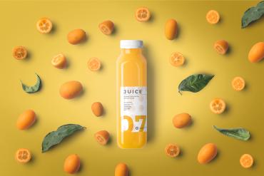 Orange Juice Bottle Mockup Top View Scene 01