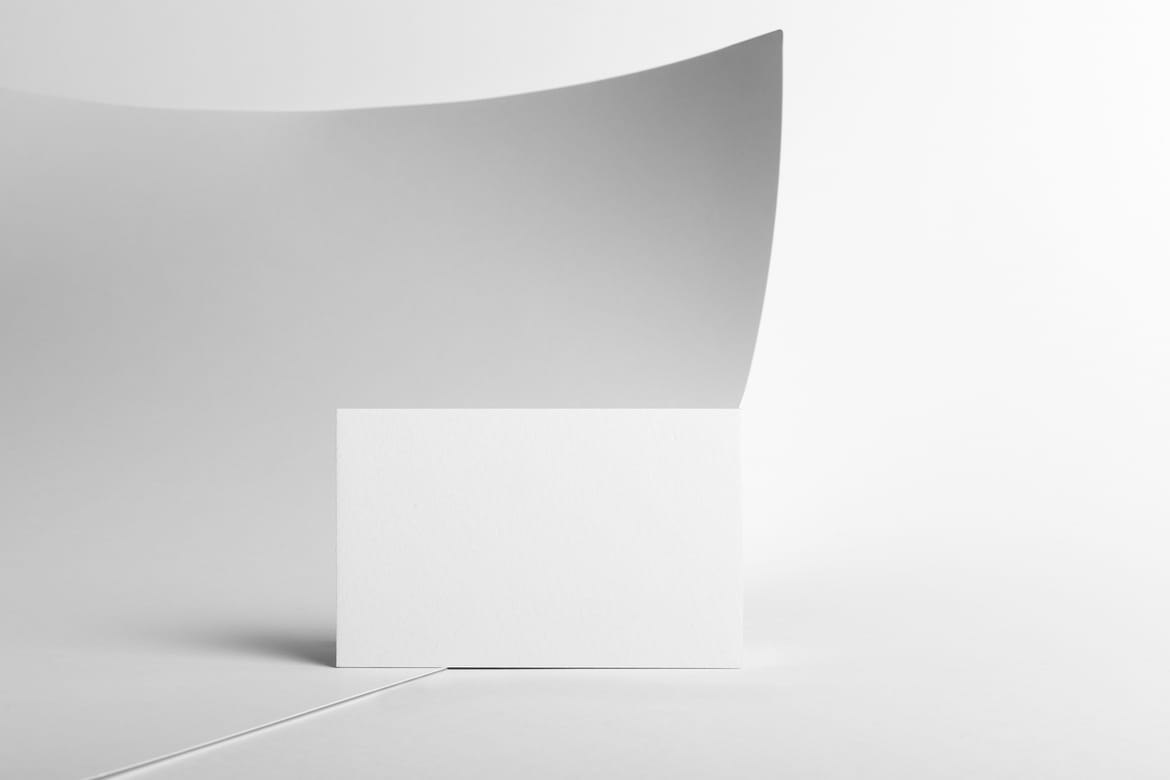 Business Card and Curved Paper Mockup Scene 01