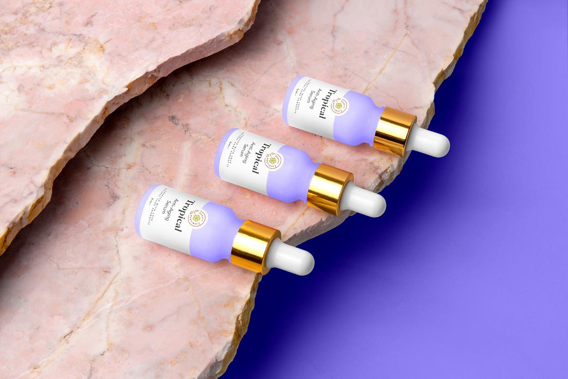 Dropper Bottles Cosmetics Mockup Scene 08