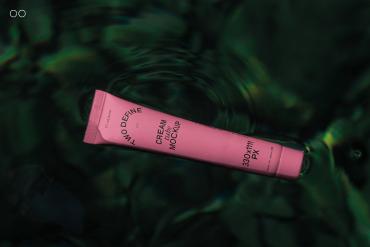 Small cream tube on water