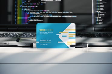 Rounded Corner Business Card Next To Laptop Mockup