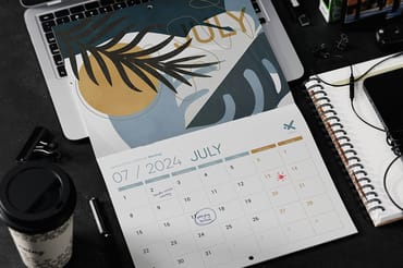 Saddle Stitch Calendar on Laptop Mockup