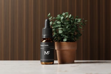 Amber Glass Dropper Bottle with Eucalyptus Plant Mockups