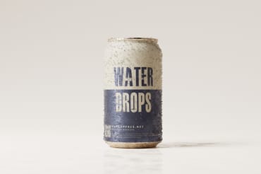 330ml Soda or Beer Can Mockups with Water Drops