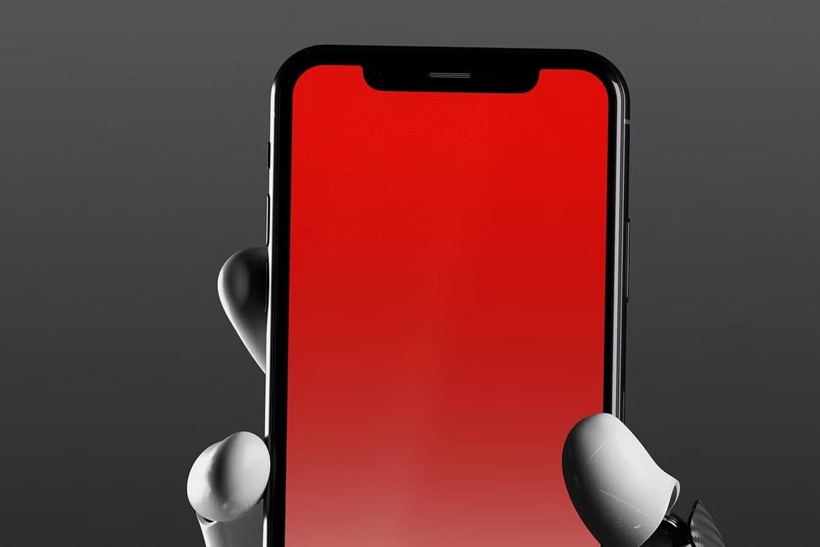Robotic hand holding iPhone X Mockup