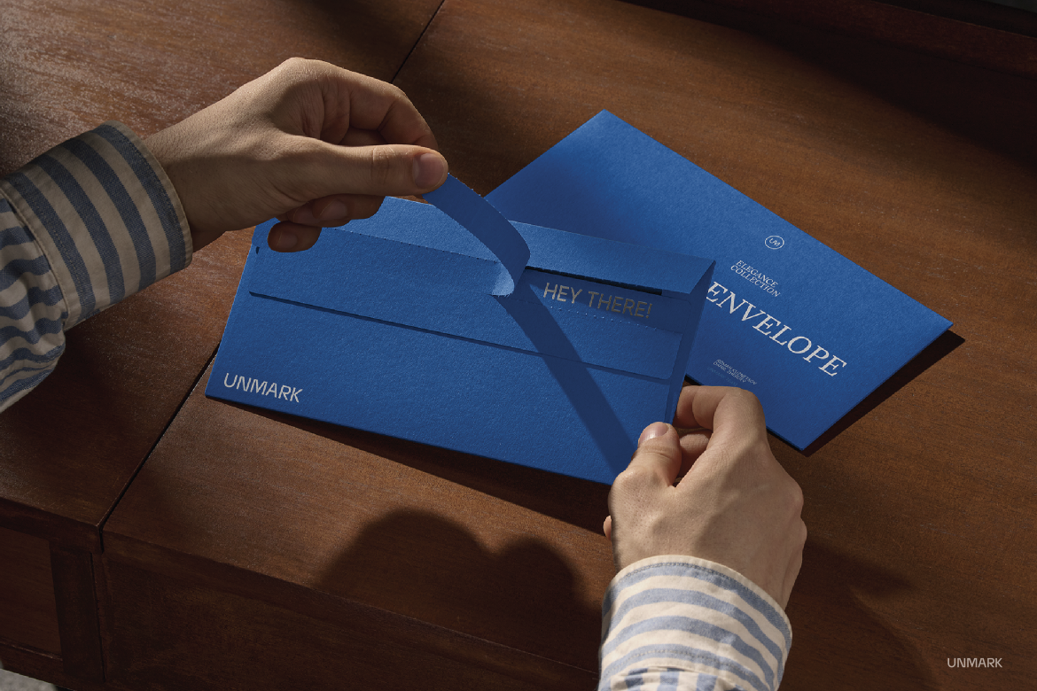 Envelope Mockups in hand