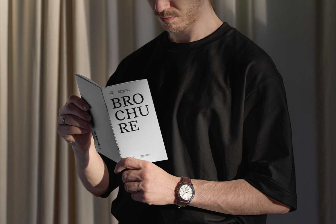 Brochure in hands Mockups