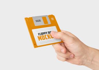 Hand Holding Floppy Disk Mockup