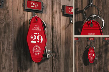 Hotel Key Ring is Hanging on the Key Rack Mockup