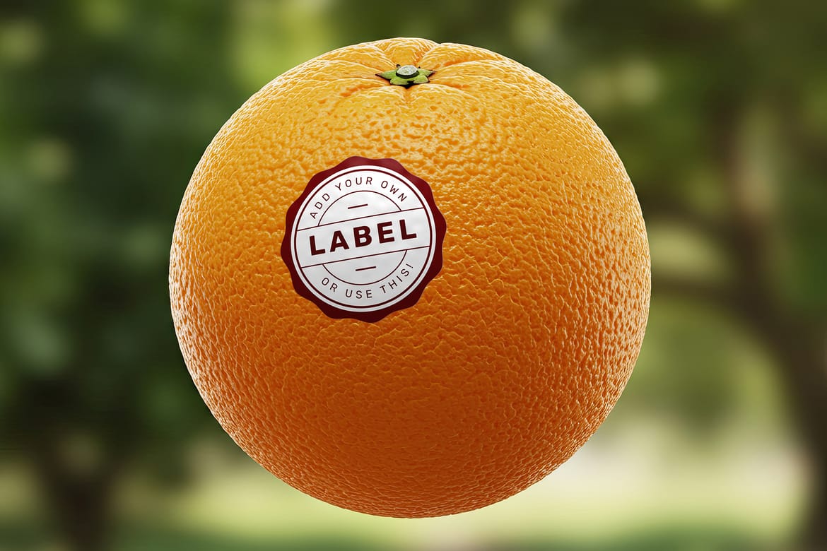 Sticker Logo Stamp on Orange Fruit Mockup