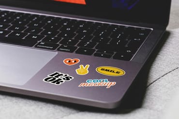 Laptop with Stickers Creation Mockups