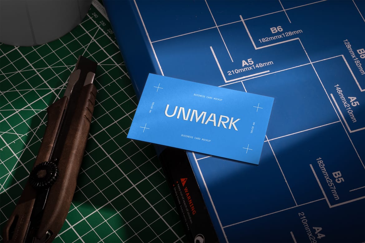 Business Card on Paper Cutter PSD Mockup