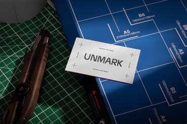 Business Card on Paper Cutter PSD Mockup