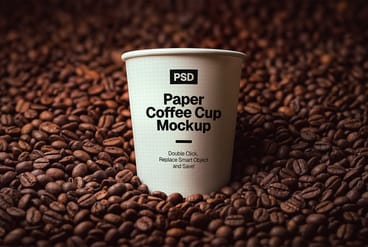 Paper Coffee Cup Mockup on Roasted Coffee Beans